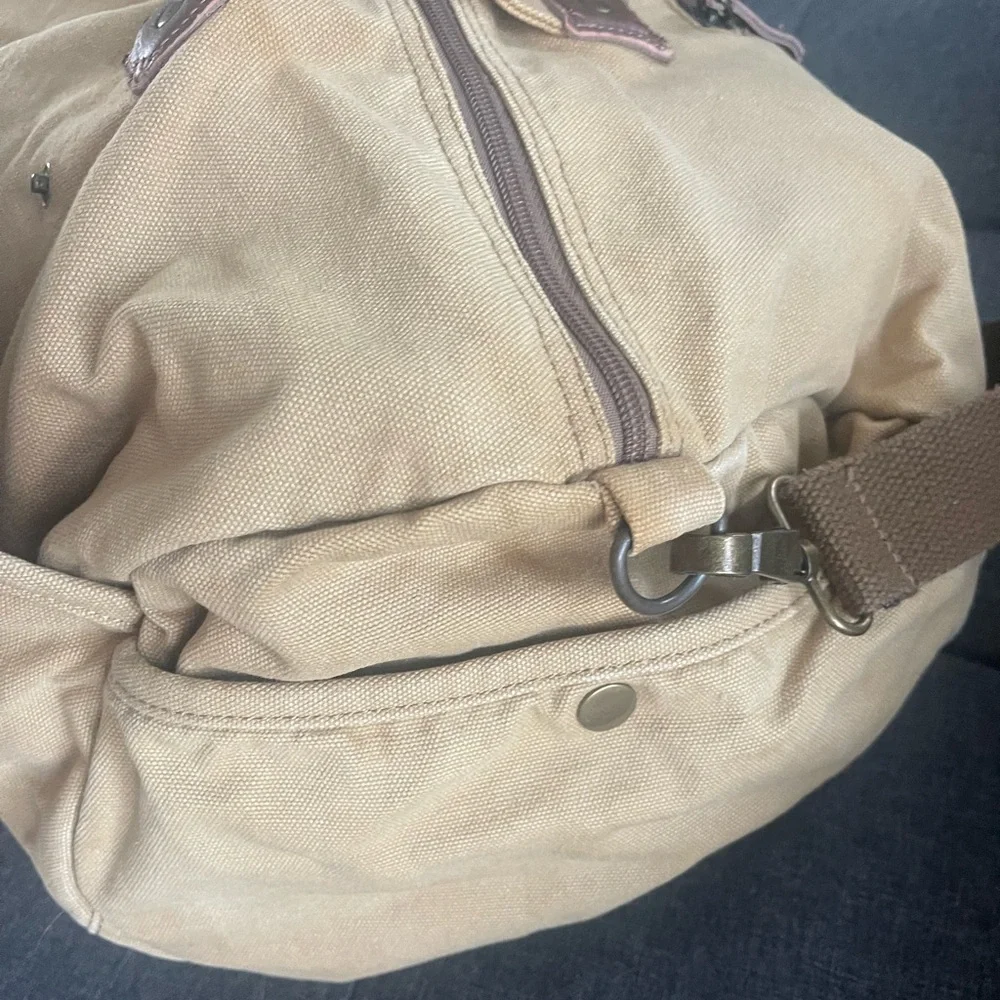 Canvas utility duffle travel bag .